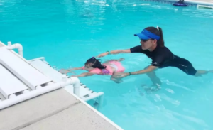 Rosie learning to swim