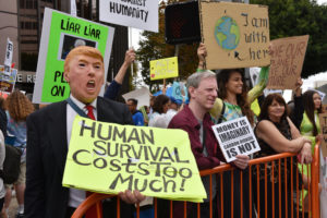 Climate Strike Protester dressed as President Trump